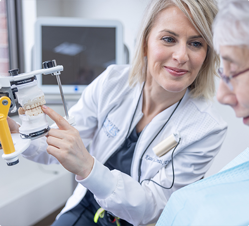 Dentist and dental patient reviewing dentistry plan