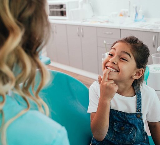 Young man with healthy smile after professional teeth cleaning