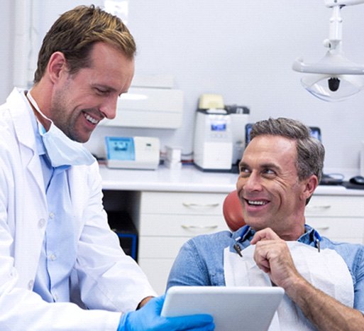 patient talking with dentist