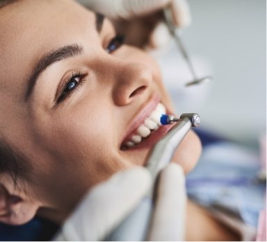 Dental patient receiving professional dental cleaning