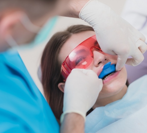 Dental patient receiving fluoride treatment