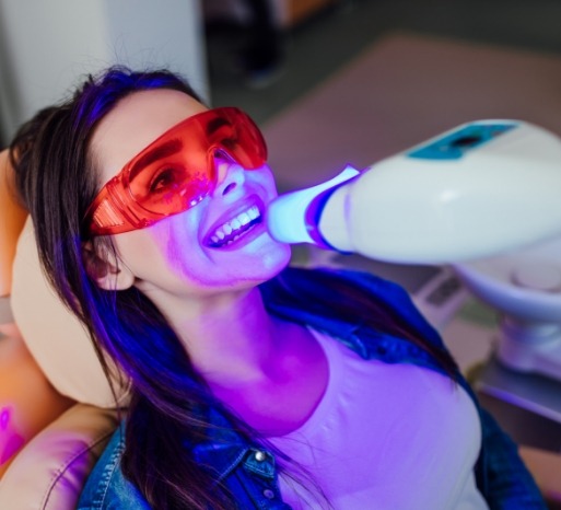 Woman receiving KoR teeth bleaching treatment