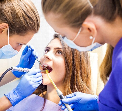 Woman having dental procedure