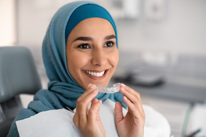 Patient getting Invisalign from dentist